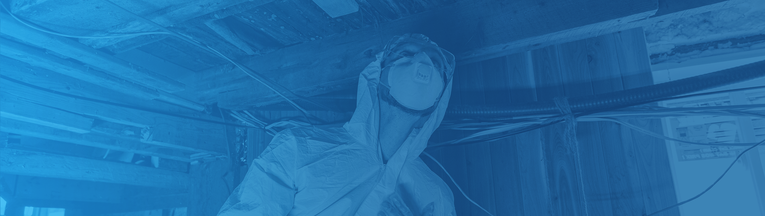 Worker in protective equipment remodeling